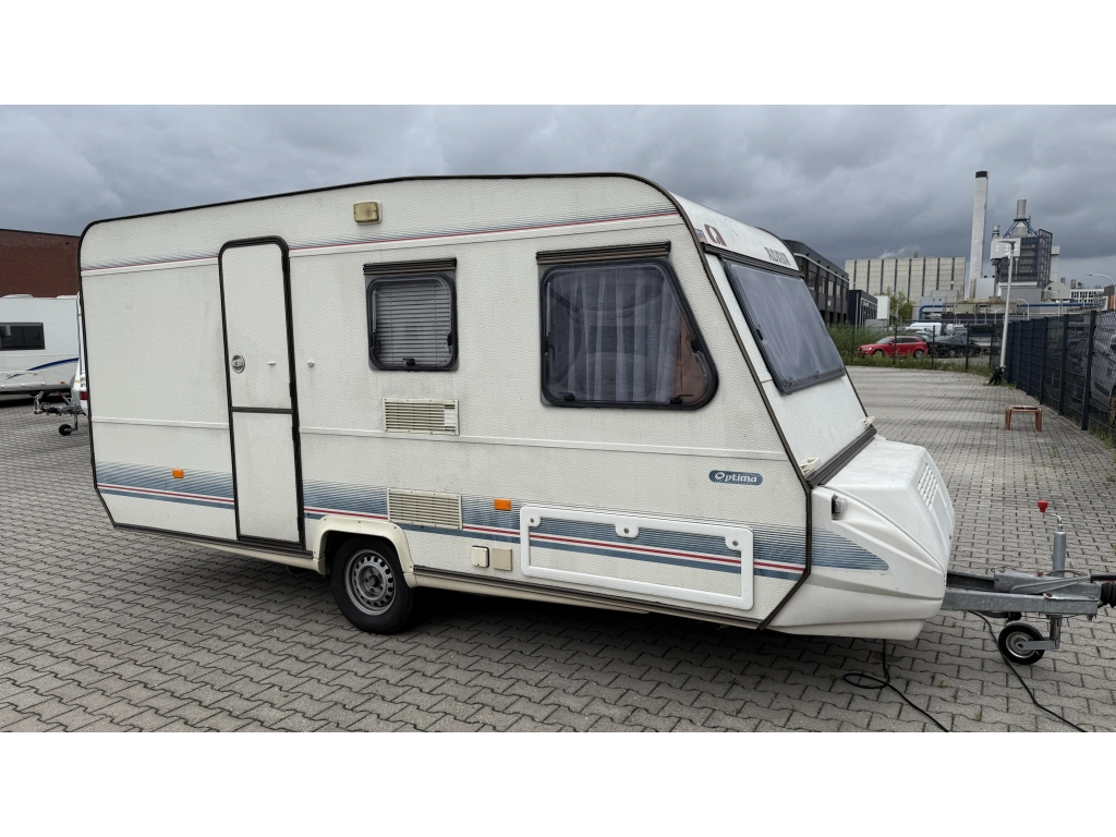 Adria Optima 425 TK vast bed zit toiletruimte