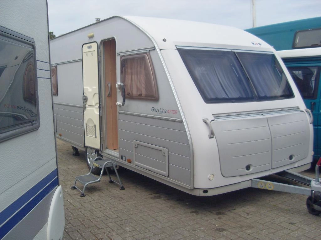 Kip Grey Line 47 TDB met Mover